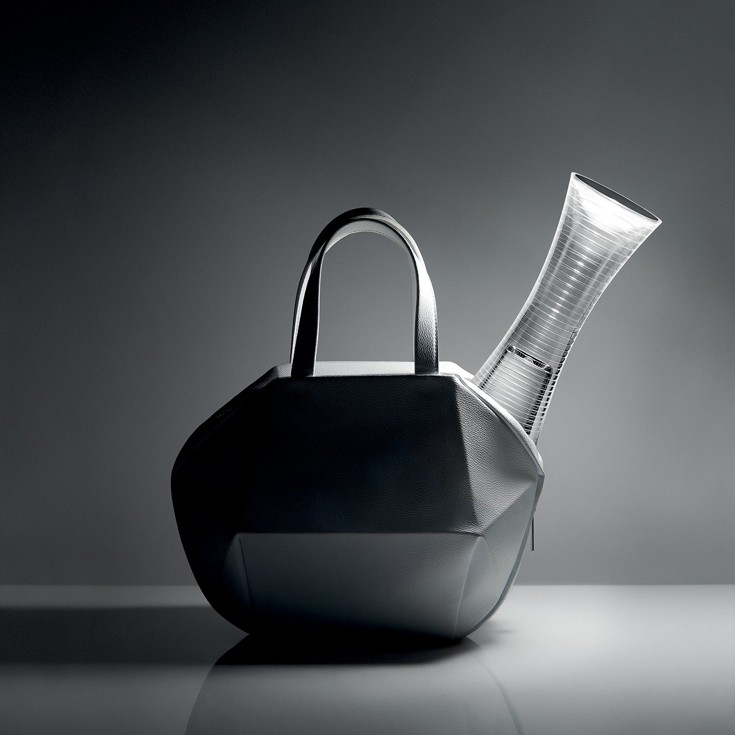Artemide Come Together Portable Lamp Ambience image showing the lamp in a bag