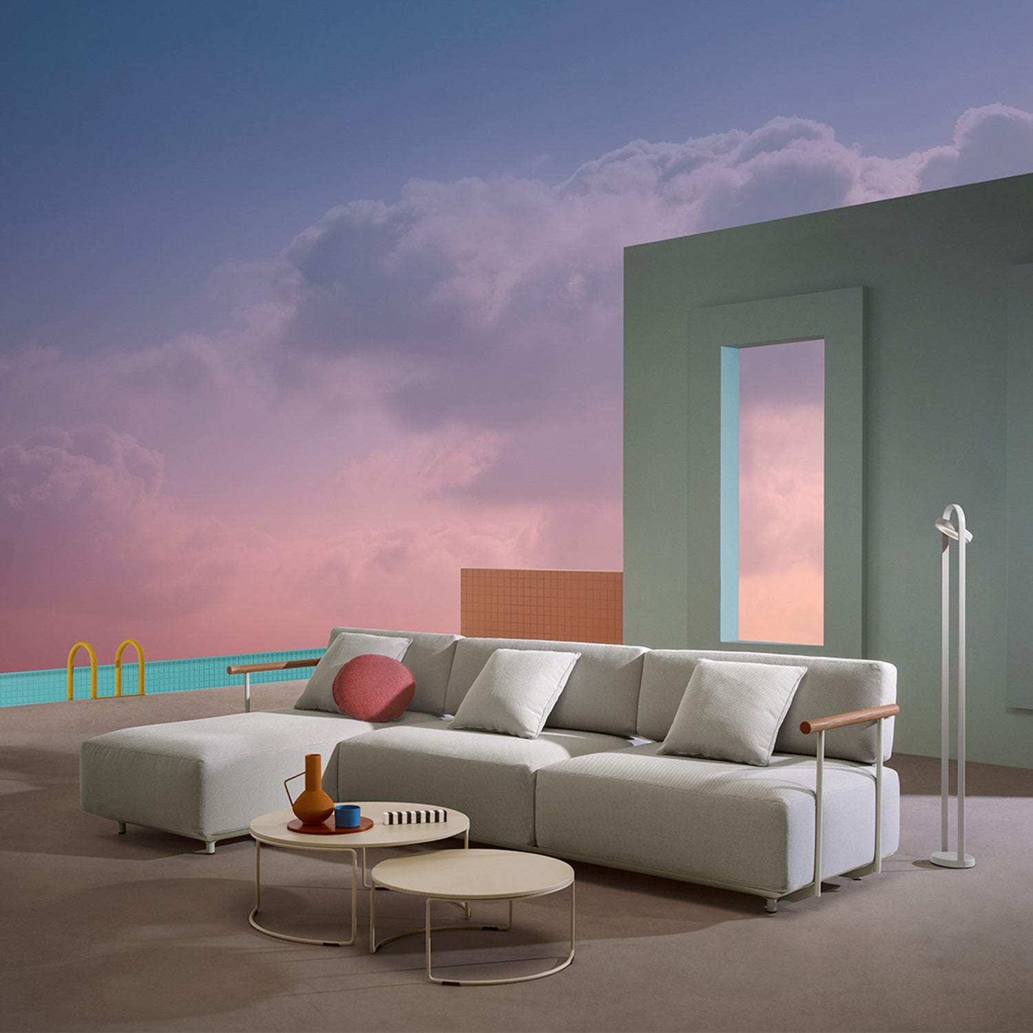 Pedrali Arki Outdoor 3 Seater Sofa in grey with a sunset int he background