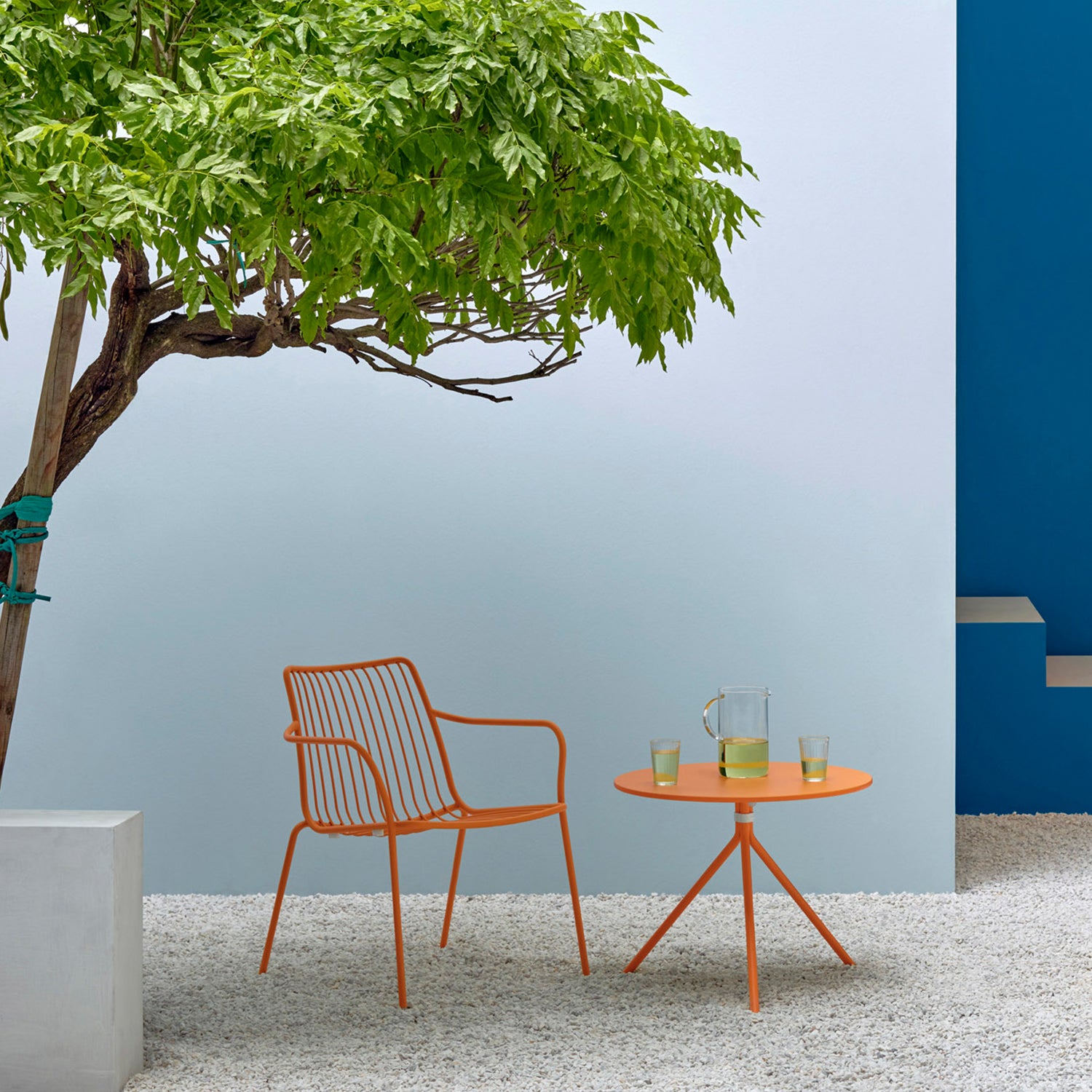 Pedrali Nolita 3659 Garden Lounge Chair in orange with matching table