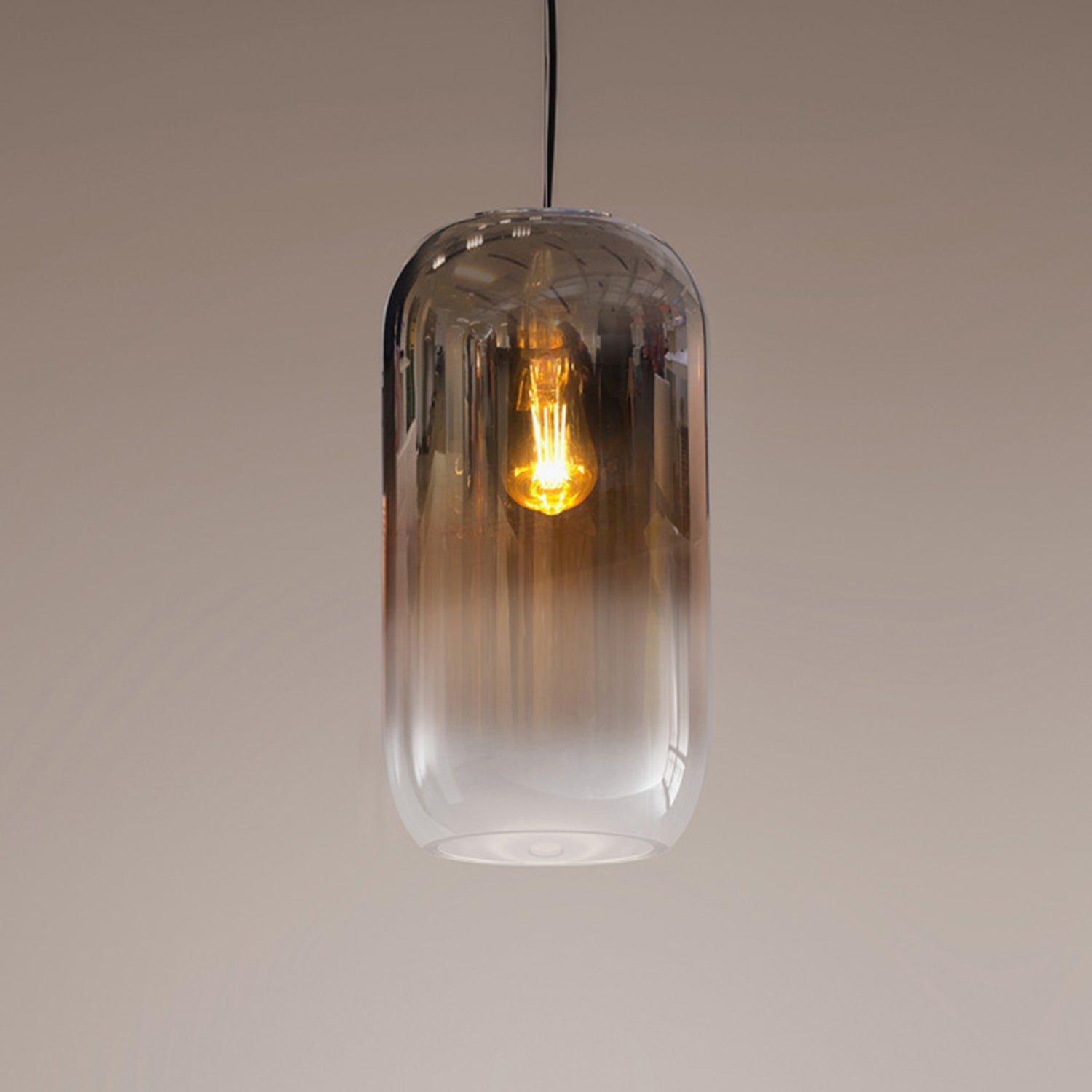 Artemide Gople pendant light in bronze ambience image