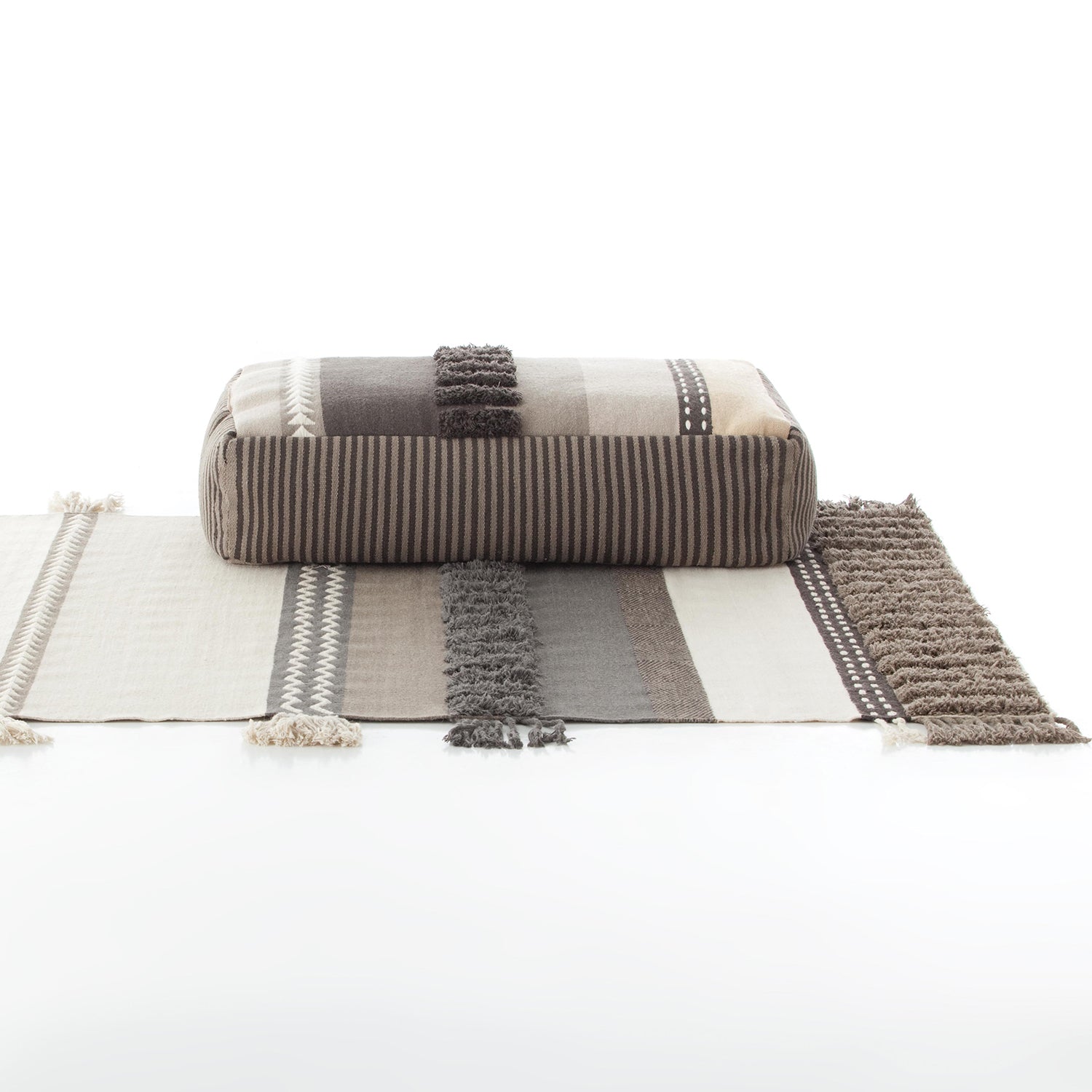 Gan Glaoui Alexandra rug in neutral colours with pouf in neutral colours