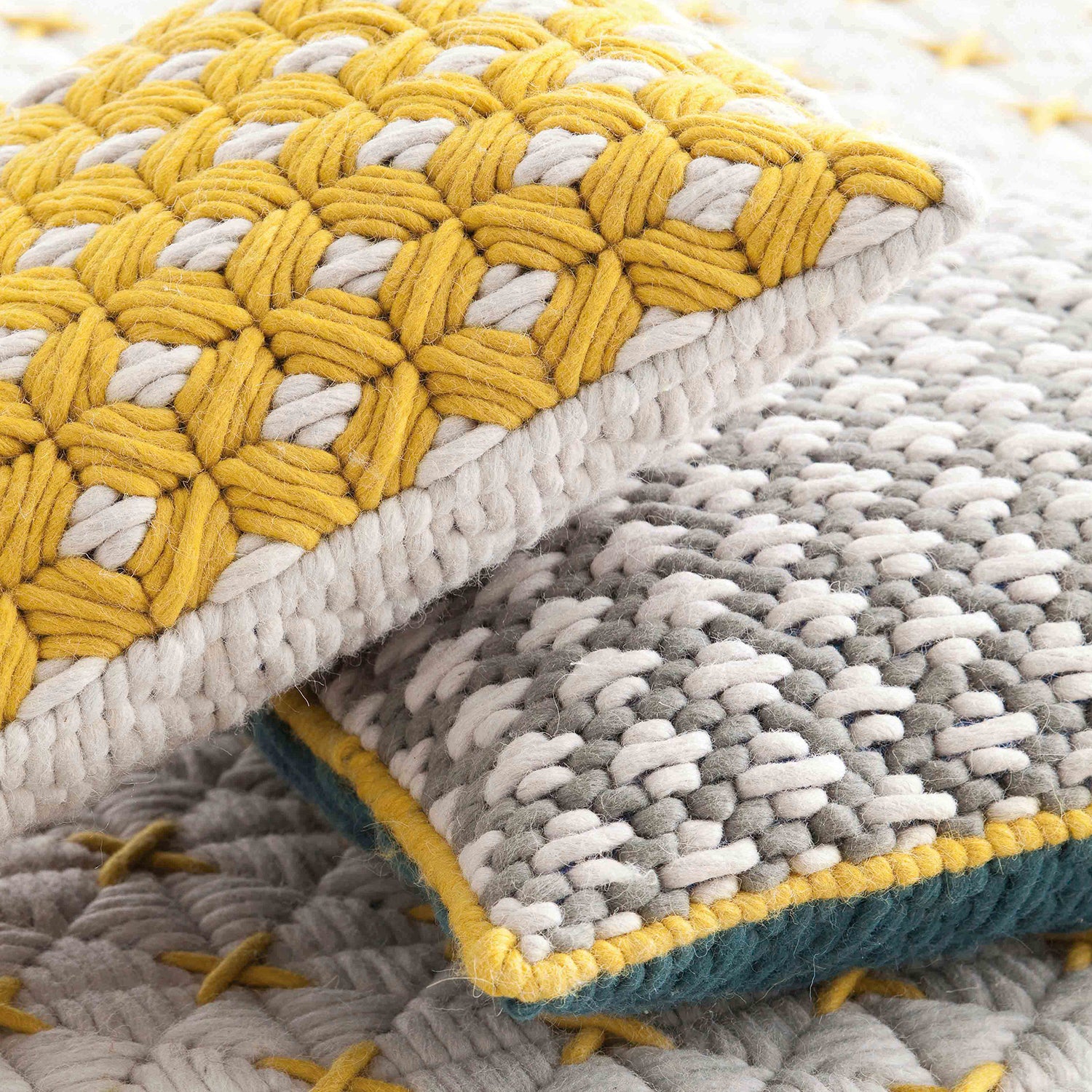 Gan Silai designer cushion 50x50 in yellow and light grey ambience image