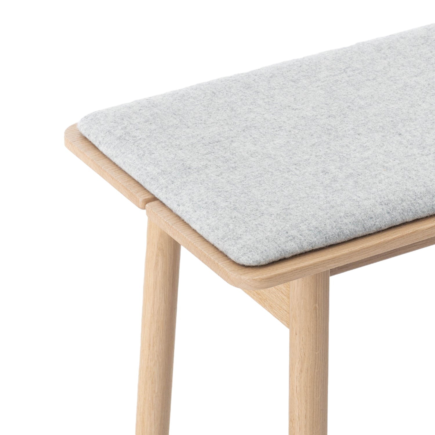 John Green Otis Bench in oak with grey wool upholstery