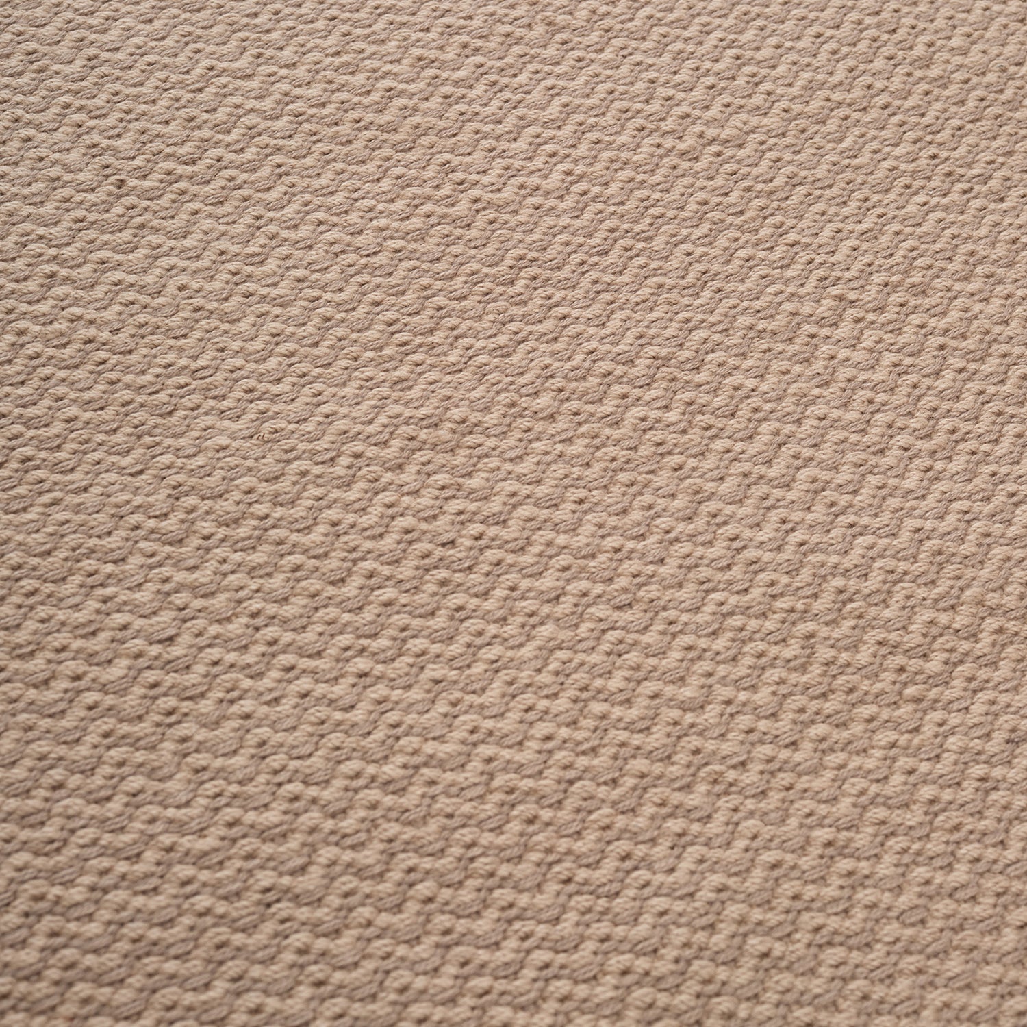 Linie Design Helix Haven outdoor rug in earth detail shot