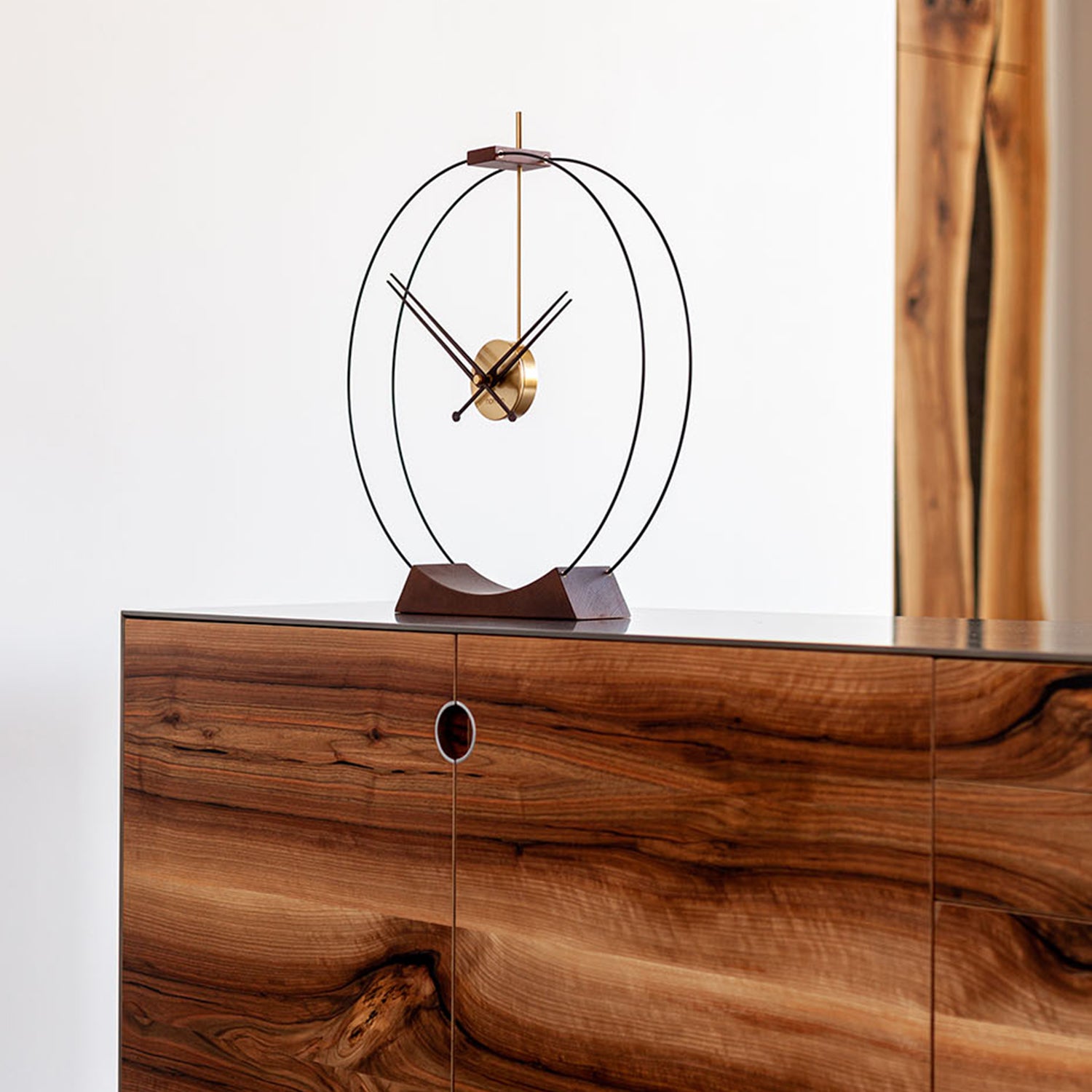 Nomon Aire Table Clock in walnut and brass ambience image