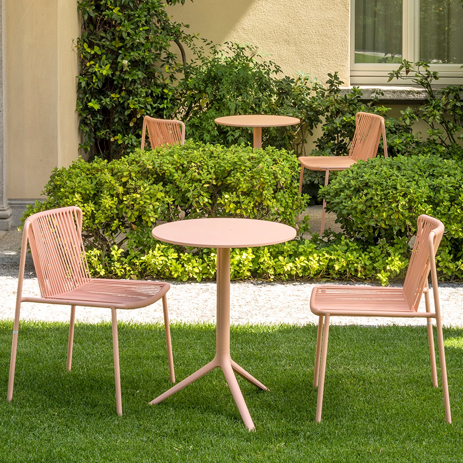 Pedrali Tribeca 3660 Outdoor Dining Chair in pink with matching table