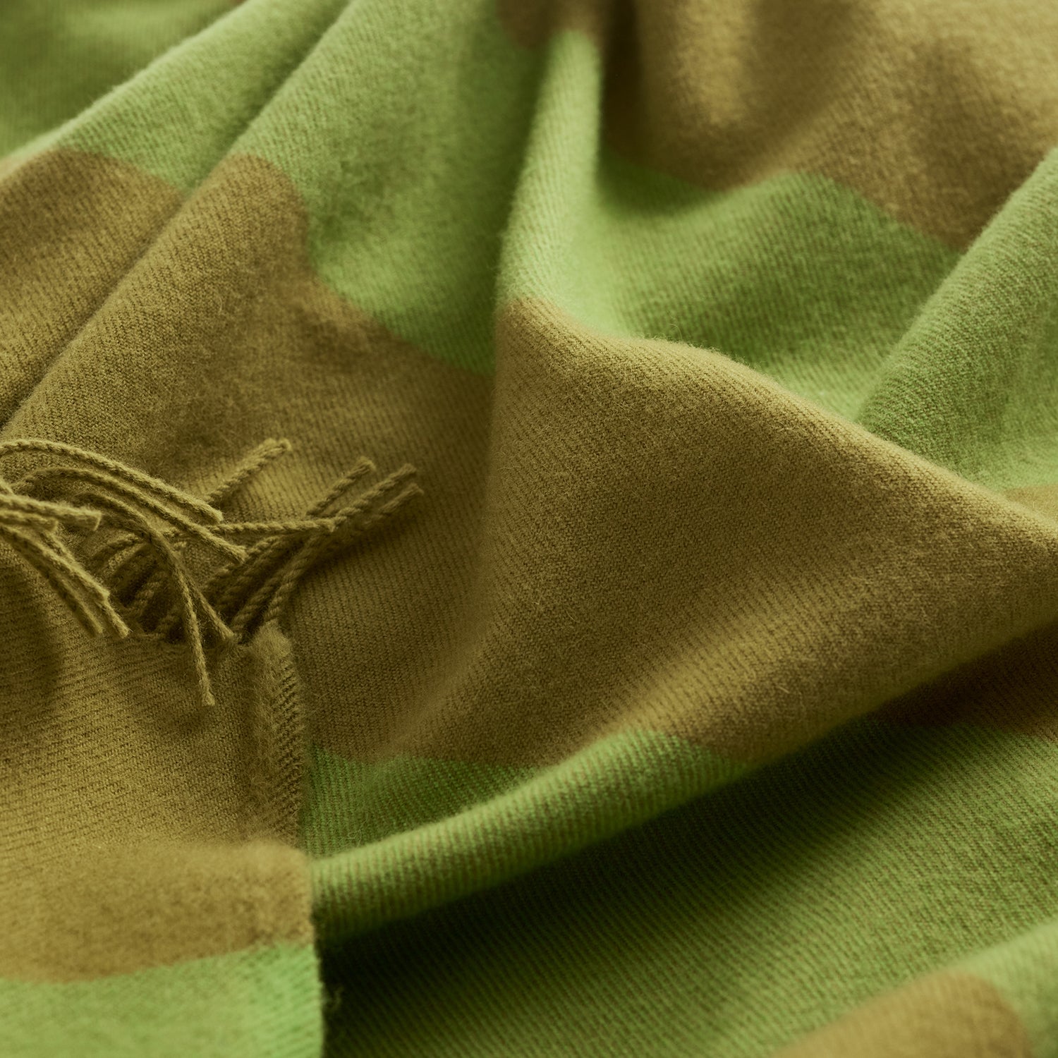 Silkeborg Ulspinderi The Sweater Polychrome Throw in sage green