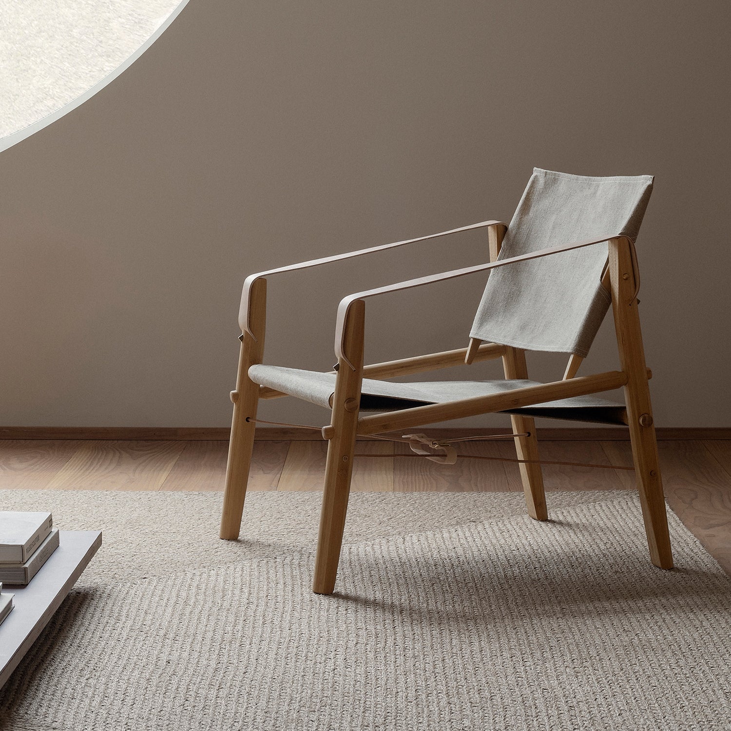 We Do Wood Nomad armchair in oak and canvas ambience image